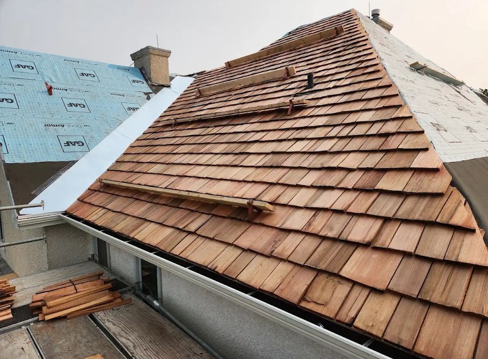 Rogers roofing & construction